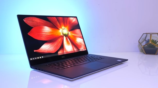 Dell XPS 7590 15.6 inch laptop. It's the only laptop coming with Intel Core i9 processor and dedicated NVIDIA 4GB GDDR5 GPU with long-lasting 97WH battery. So, a business class laptop to meet the gaming needs with small-scale machine learning programming.