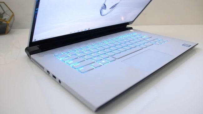 The hinge of the laptop, running along the most of the base. Moreover, it's not 180-degree hinge.