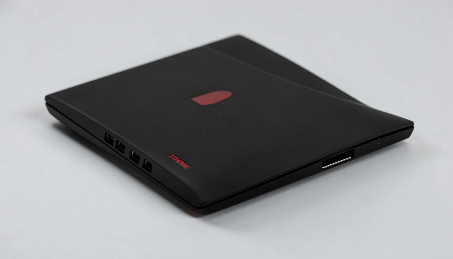 Matte black ThinkPad with red TrackPoint, professional and understated business look