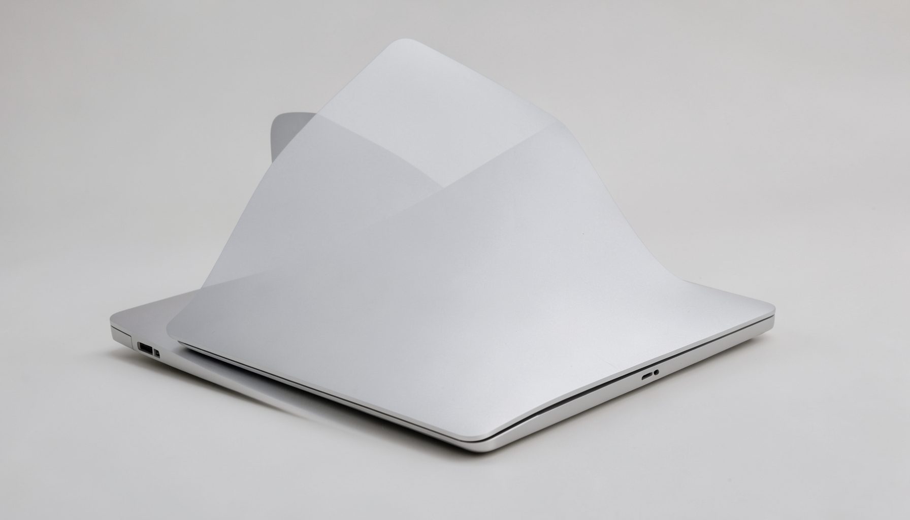 Thin silver Acer Swift laptop with metallic lid, lightweight and portable design